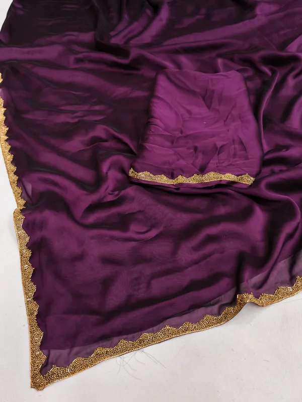 New_Party_Wear_Rangoli_Silk_Wine_color_saree_with_Blouse_and_stone_lace_Border