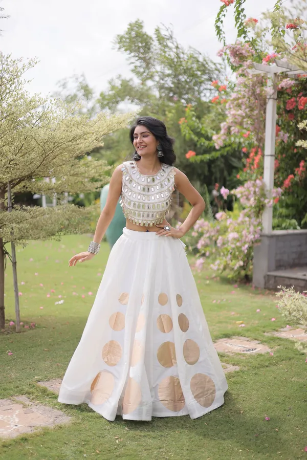 Celebrate_Navratri_festive_vibes_with_this_traditional_&_stylish_Lehenga_with_Top,_perfect_for_dance,_devotion_&_togetherness._Available_in_vibrant_colors_with_a_stitched_blouse_�_ready_to_wear.