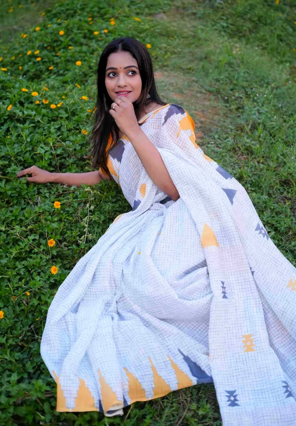 Off-white_and_yellow_Colour_Linen_Saree_(With_Unstitched_Blouse_Piece)_(For_Women)
