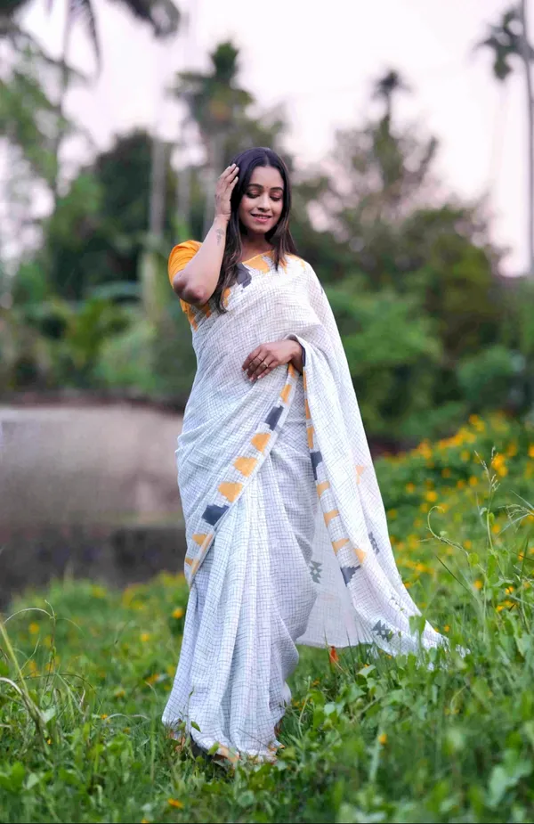 Off-white_and_yellow_Colour_Linen_Saree_(With_Unstitched_Blouse_Piece)_(For_Women)