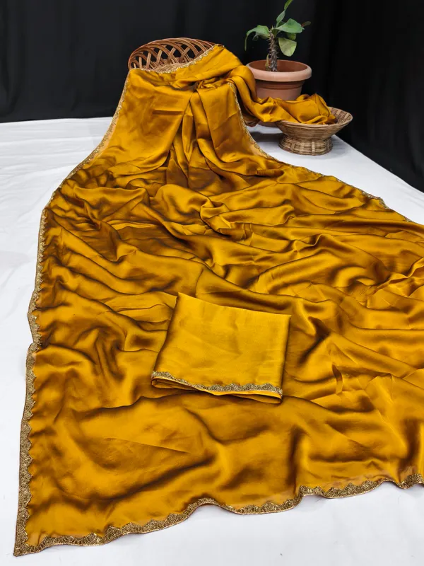 New_Party_Wear_Rangoli_Silk_Gold_color_saree_with_Blouse_and_stone_lace_Border