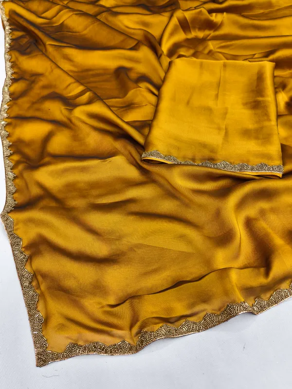 New_Party_Wear_Rangoli_Silk_Gold_color_saree_with_Blouse_and_stone_lace_Border