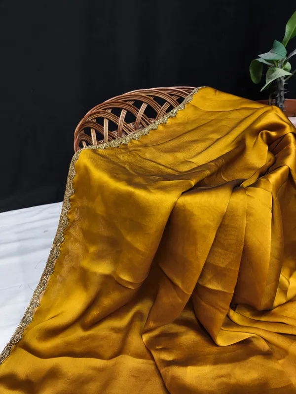 New_Party_Wear_Rangoli_Silk_Gold_color_saree_with_Blouse_and_stone_lace_Border