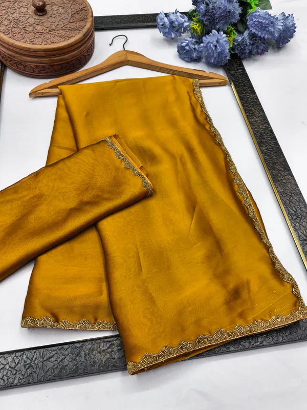 New_Party_Wear_Rangoli_Silk_Gold_color_saree_with_Blouse_and_stone_lace_Border