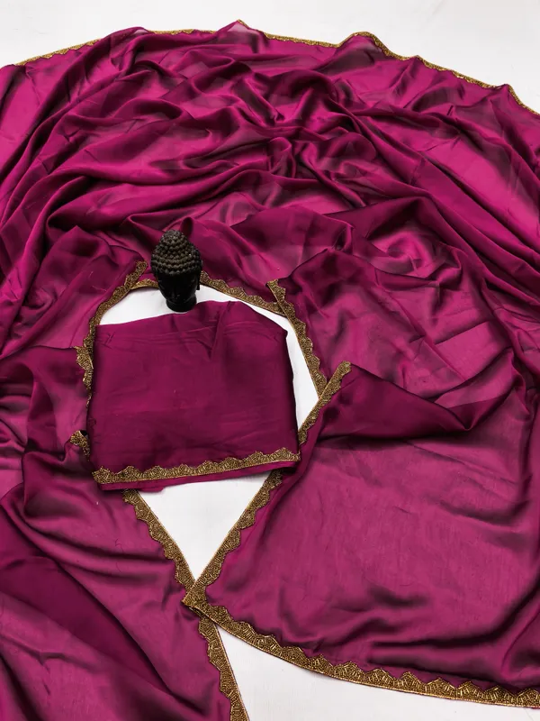 New_Party_Wear_Rangoli_Silk_Rani_color_saree_with_Blouse_and_stone_lace_Border