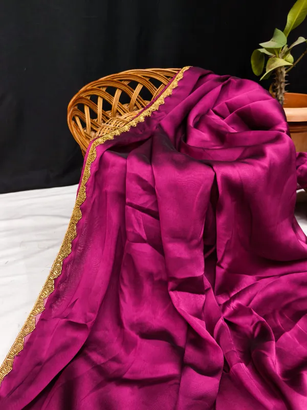 New_Party_Wear_Rangoli_Silk_Rani_color_saree_with_Blouse_and_stone_lace_Border
