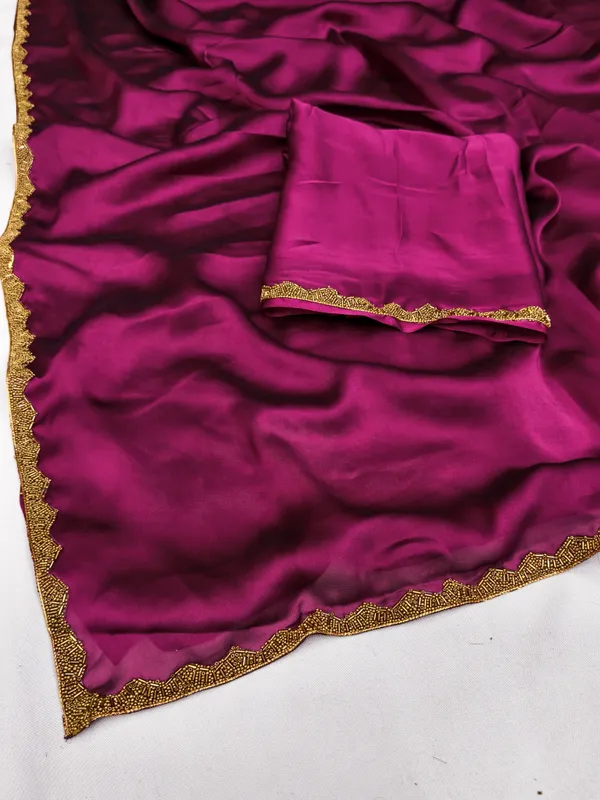New_Party_Wear_Rangoli_Silk_Rani_color_saree_with_Blouse_and_stone_lace_Border