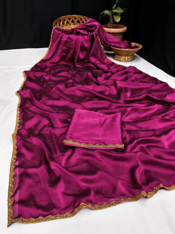 New_Party_Wear_Rangoli_Silk_Rani_color_saree_with_Blouse_and_stone_lace_Border
