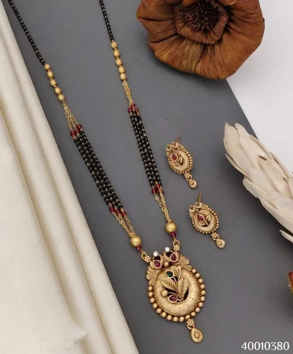 Designer_High_Gold_Plated_Ad_Diaond_Studded_Fancy_Mangalsutra_With_Earring
