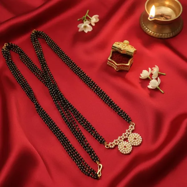 Traditional_Long_4_Line_Mala_Style_Black_Bead_Mangalsutra_With_Stone_Pendant_For_Women