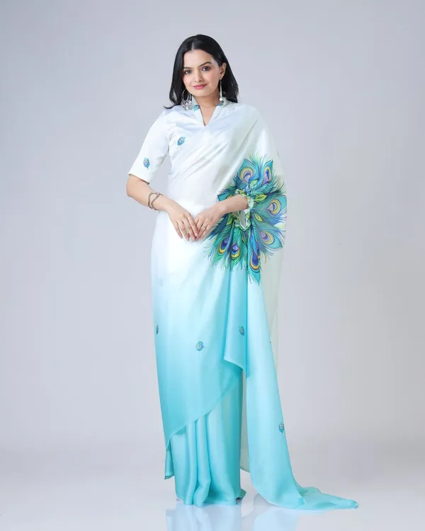 Teal_Trendy_Free-Hand_Peacock_Feather_Print_Saree