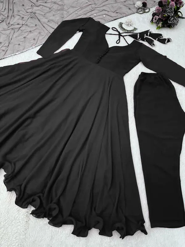 Designer_Suit_on_Faux_Georgette_Febric_with_inner_&_tassel_&_potali_button_and_Pent_on_Faux_Georgette_Febric_with_inner_and_Dupatta_on_Faux_Georgette_febric_with_Sequnce_work_with_Fancy_Lace