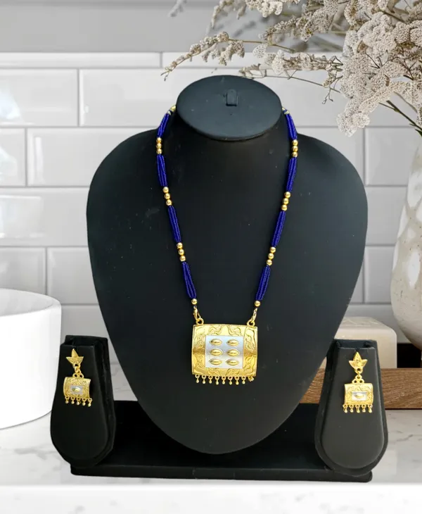 Assamese_Traditional_Gold-Silver_Biscuit_With_Kd_Blue_Tassel_Bm