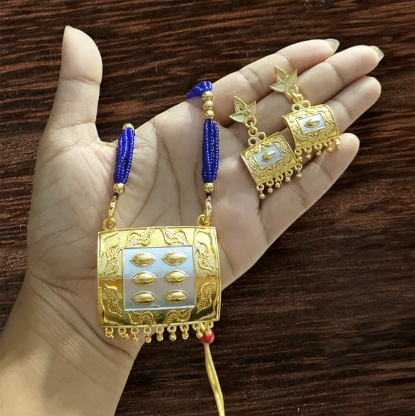 Assamese_Traditional_Gold-Silver_Biscuit_With_Kd_Blue_Tassel_Bm