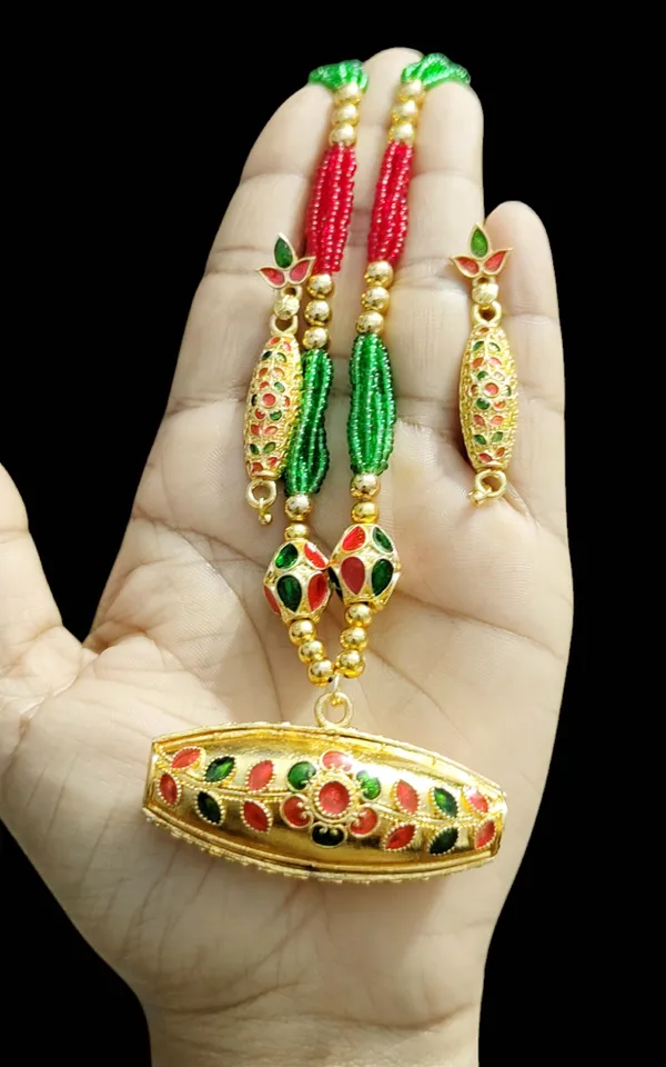 Assamese_Traditional_Copper_Based_Red_Green_Dholpuri_Ball_Tassel_Jewelry_Set