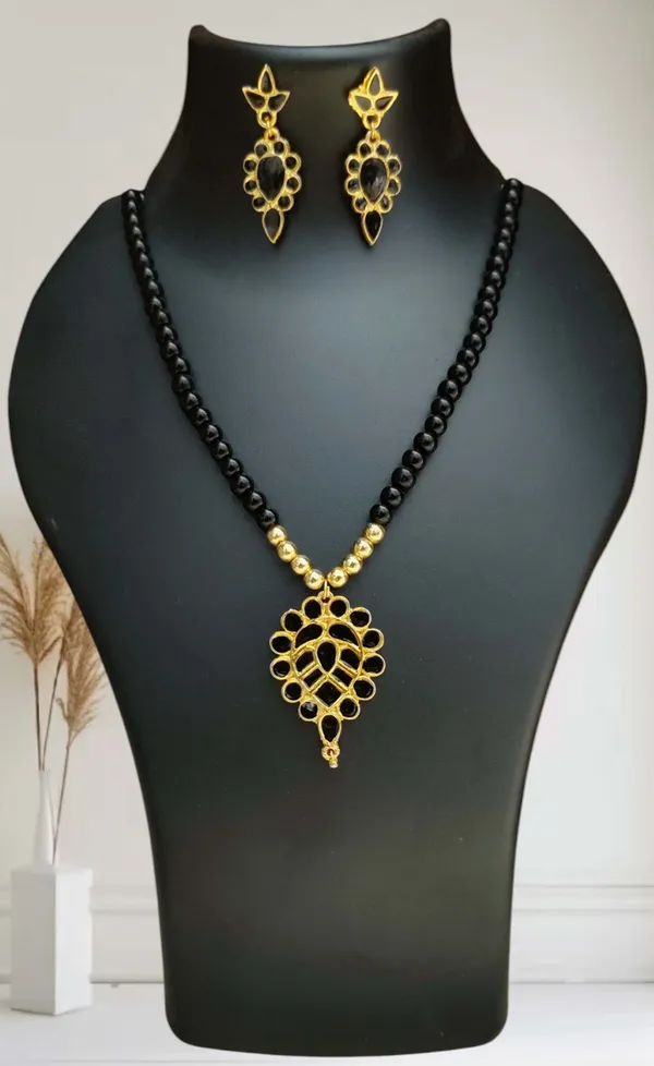 Assamese_Traditional_Copper_Based_Black_Dugdugi_Moni_Tassel_Jewellery_Set