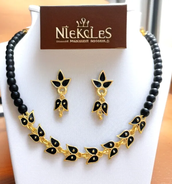 Assamese_Traditional_Copper_Based_Black_Leaf_Design_With_Golden_Ball_Golpata_Jewellery_Set