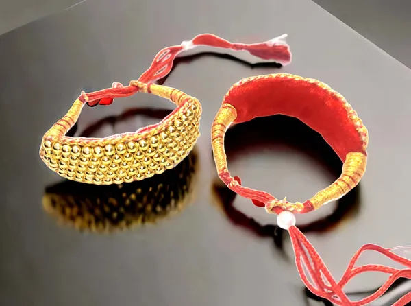 Balaji_Gold_Traditional_Rajasthani_Gold-Plated_Bajuband_Set_with_Adjustable_Red_Silk_Thread_(Set_of_2)