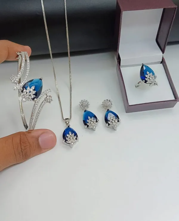 https://d1311wbk6unapo.cloudfront.net/NushopCatalogue/tr:f-webp,w-600,fo-auto/64cb74f70d097700129a7df0/cat_img/AD_Pendant_Set_HTQU6IRLMM_2024-10-14_1.jpeg__Twinkle Star Fashion Hub