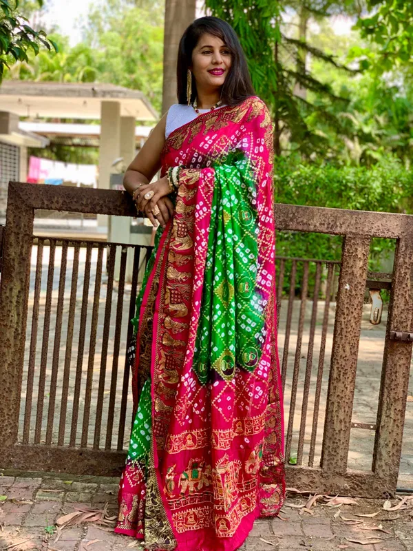 New_Bandhani_Silk_Zari_With_Stunning_Emroedry_Work_And_WovenBorder_Saree_Unstiched_Blouse_Fabric