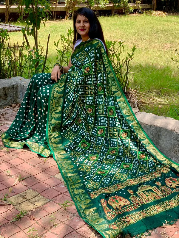 New_Bandhani_Silk_Zari_With_Stunning_Emroedry_Work_And_WovenBorder_Saree_Unstiched_Blouse_Fabric