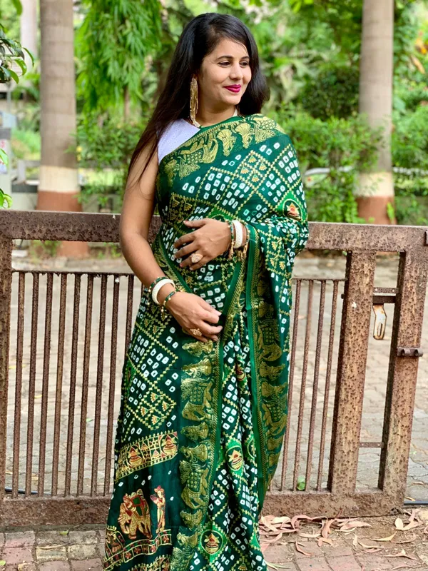 New_Bandhani_Silk_Zari_With_Stunning_Emroedry_Work_And_WovenBorder_Saree_Unstiched_Blouse_Fabric