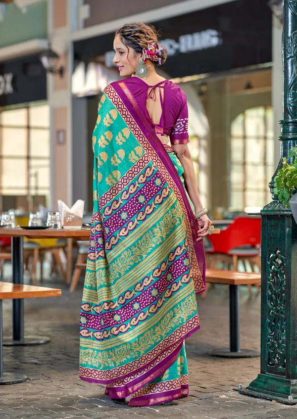 Teal_Beautiful_Zari_Border_Handicraft_Pure_Soft_MulMul_Ikkat_Hand_Print_Cotton_Saree_With_Blouse_Piece