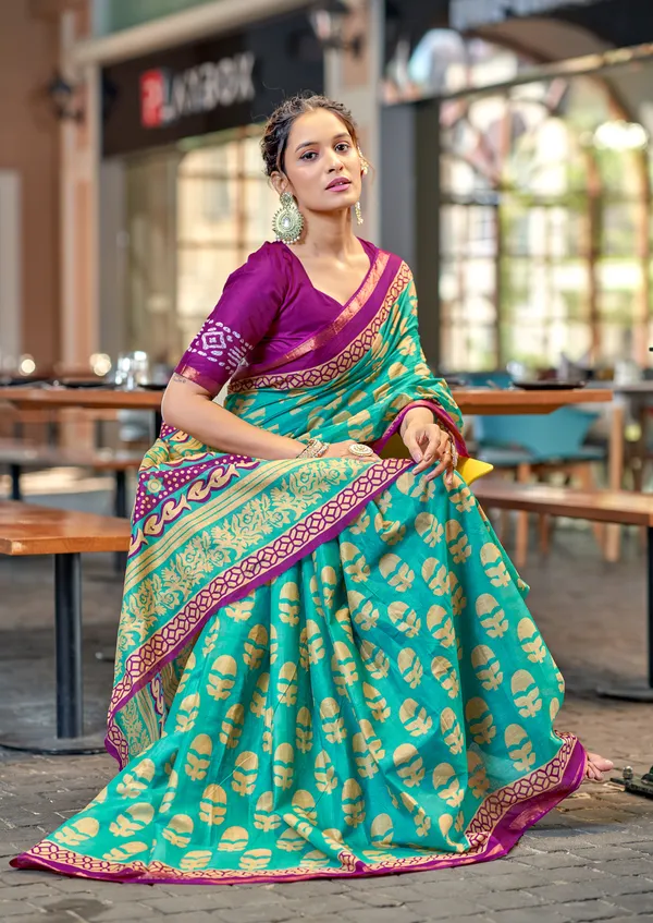 Teal_Beautiful_Zari_Border_Handicraft_Pure_Soft_MulMul_Ikkat_Hand_Print_Cotton_Saree_With_Blouse_Piece