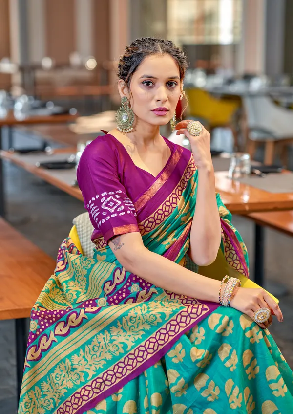 Teal_Beautiful_Zari_Border_Handicraft_Pure_Soft_MulMul_Ikkat_Hand_Print_Cotton_Saree_With_Blouse_Piece