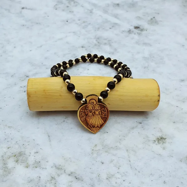 Wooden_Carving_Radha_Krishna_pendant_with_Black_crystal_chain_(H.HRT.Bcry)