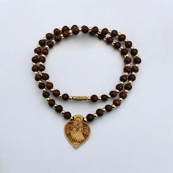 Wooden_Carving_Radha_Krishna_pendant_with_Lal_Chandan_chain_(RK.HRT.Lal.Chn)