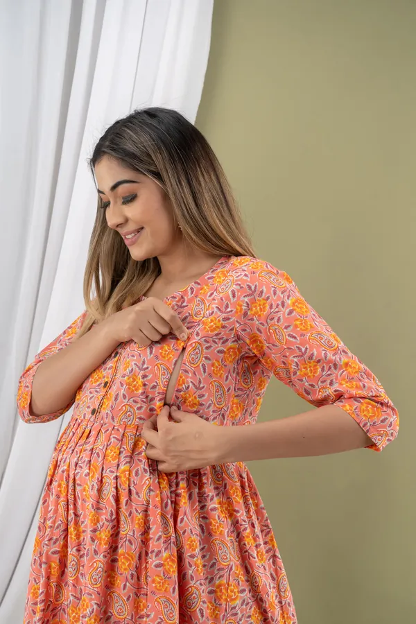 PEACH_PRINTED_MATERNITY_DRESS