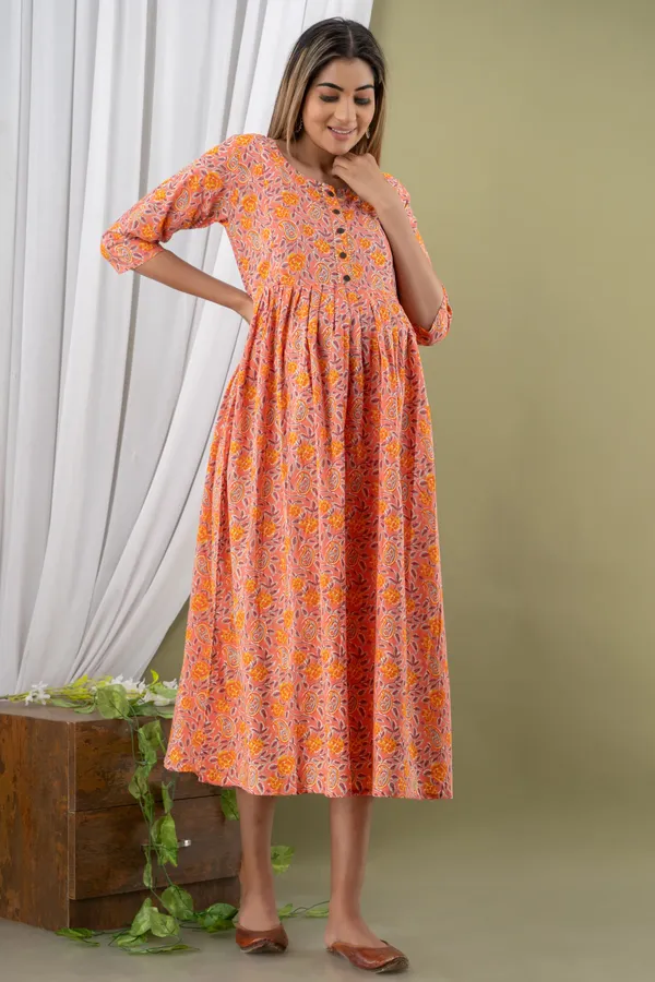 PEACH_PRINTED_MATERNITY_DRESS