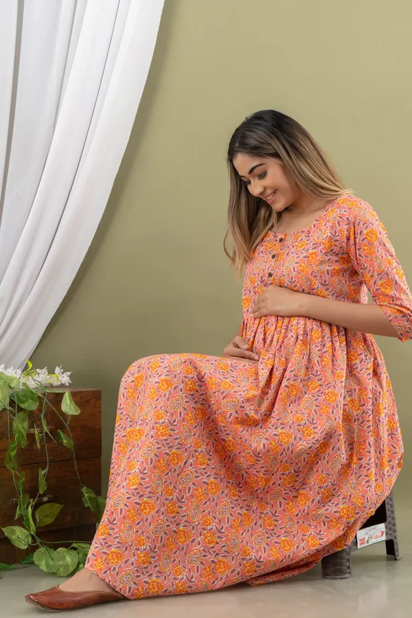 PEACH_PRINTED_MATERNITY_DRESS