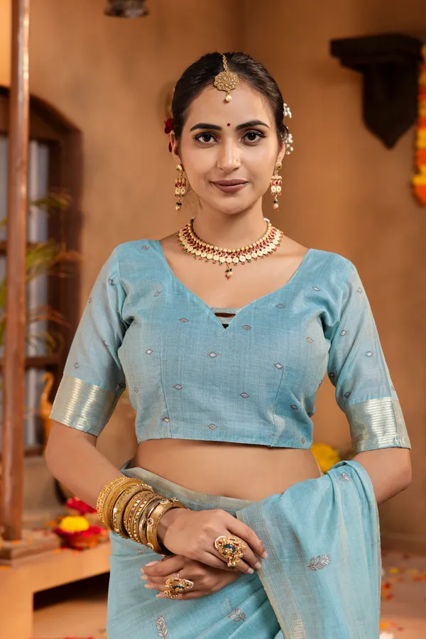 Kashish_Sky_Blue_–_Alluring_Wedding_Special_|_Premium_Soft_Muga_Cotton_Saree_with_Colourful_Resham_Weaving_Peacock_Design_Pallu