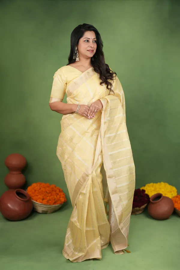 Soft_Linen_Cotton_Silk_sarees_with_Beautiful_Weaving__Zari_Butti_Design_With_Attractive_Border_&_Rich_Pallu__And_Running__Plain_Blouse_With_Tassels