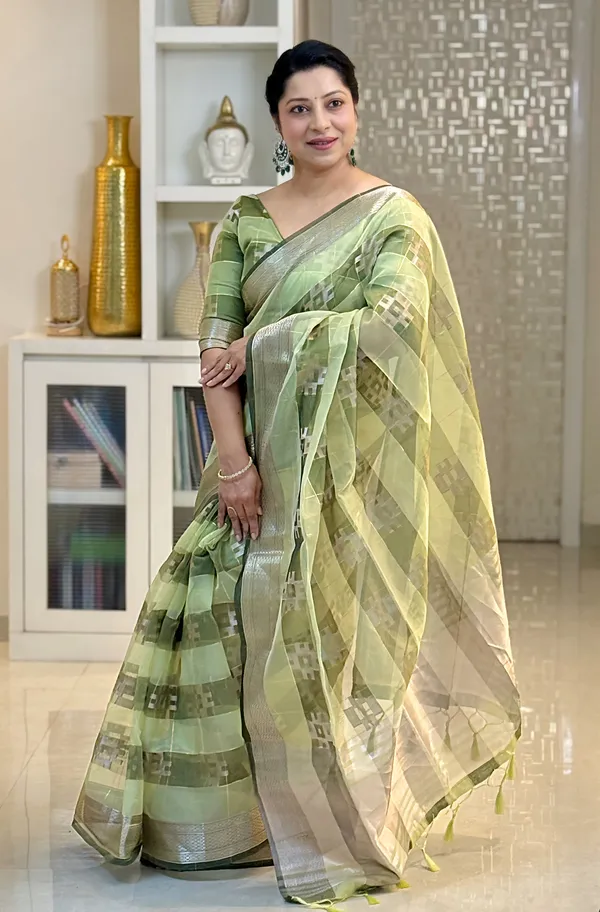 Yatika_Green_–_Diwali_Special_|_Soft_Tissue_Silk_Saree_with_Weaving_Zari_Work,_Border_&_Rich_Pallu_&_Running_Blouse_with_Tassels