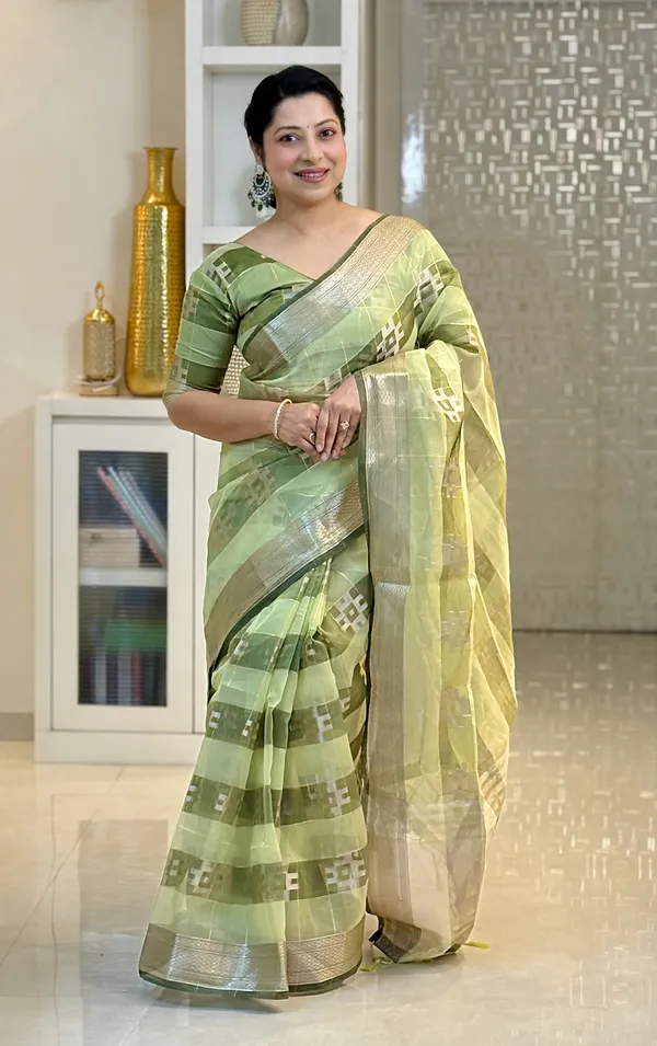 Yatika_Green_–_Diwali_Special_|_Soft_Tissue_Silk_Saree_with_Weaving_Zari_Work,_Border_&_Rich_Pallu_&_Running_Blouse_with_Tassels