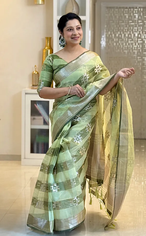 Yatika_Green_–_Diwali_Special_|_Soft_Tissue_Silk_Saree_with_Weaving_Zari_Work,_Border_&_Rich_Pallu_&_Running_Blouse_with_Tassels