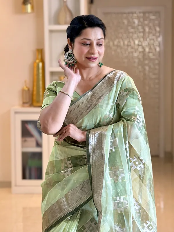 Yatika_Green_–_Diwali_Special_|_Soft_Tissue_Silk_Saree_with_Weaving_Zari_Work,_Border_&_Rich_Pallu_&_Running_Blouse_with_Tassels