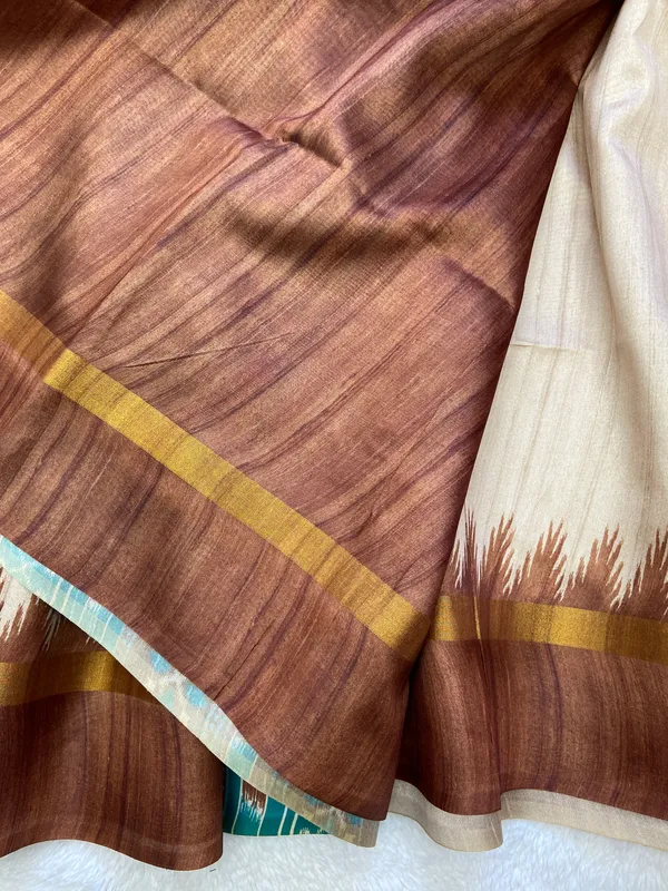 Vamika_Coffee_Brown_&_Rama_Green_–_Divine_Navratri_Special_|_Soft_Tussar_Silk_Saree_with_Print,_Border_&_Contrast_Print_Blouse_with_Tassels