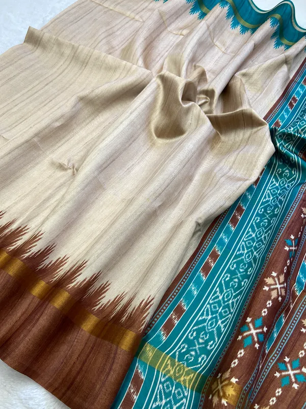 Vamika_Coffee_Brown_&_Rama_Green_–_Divine_Navratri_Special_|_Soft_Tussar_Silk_Saree_with_Print,_Border_&_Contrast_Print_Blouse_with_Tassels