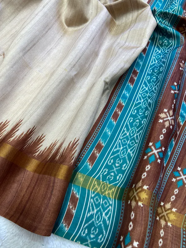 Vamika_Coffee_Brown_&_Rama_Green_–_Divine_Navratri_Special_|_Soft_Tussar_Silk_Saree_with_Print,_Border_&_Contrast_Print_Blouse_with_Tassels