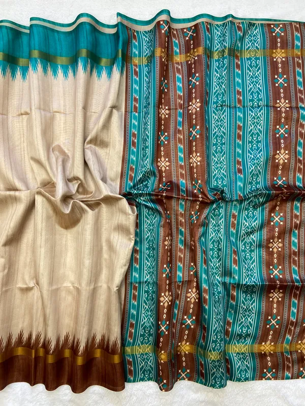 Vamika_Coffee_Brown_&_Rama_Green_–_Divine_Navratri_Special_|_Soft_Tussar_Silk_Saree_with_Print,_Border_&_Contrast_Print_Blouse_with_Tassels