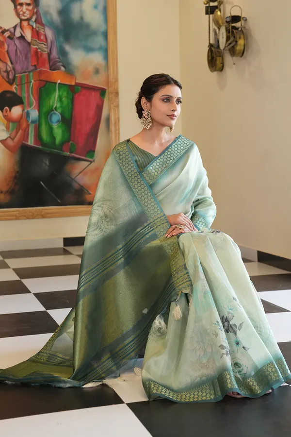 Savya_Rama_Green_–_Diwali_Special_|_Soft_Tissue_Silk_Saree_with_Digital_Print,_Border_&_Rich_Pallu,_Sequence_&_Contrast_Print_Blouse_with_Tassels