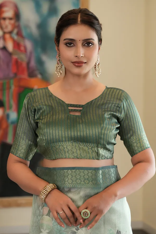 Savya_Rama_Green_–_Diwali_Special_|_Soft_Tissue_Silk_Saree_with_Digital_Print,_Border_&_Rich_Pallu,_Sequence_&_Contrast_Print_Blouse_with_Tassels