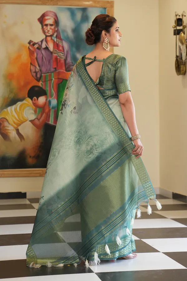 Savya_Rama_Green_–_Diwali_Special_|_Soft_Tissue_Silk_Saree_with_Digital_Print,_Border_&_Rich_Pallu,_Sequence_&_Contrast_Print_Blouse_with_Tassels
