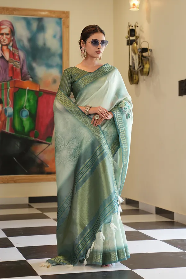 Savya_Rama_Green_–_Diwali_Special_|_Soft_Tissue_Silk_Saree_with_Digital_Print,_Border_&_Rich_Pallu,_Sequence_&_Contrast_Print_Blouse_with_Tassels