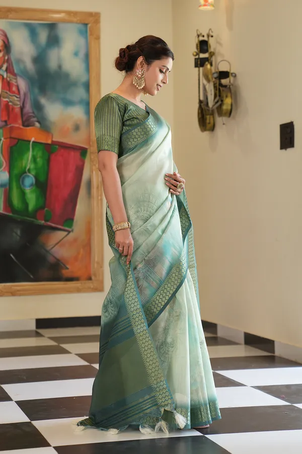 Savya_Rama_Green_–_Diwali_Special_|_Soft_Tissue_Silk_Saree_with_Digital_Print,_Border_&_Rich_Pallu,_Sequence_&_Contrast_Print_Blouse_with_Tassels
