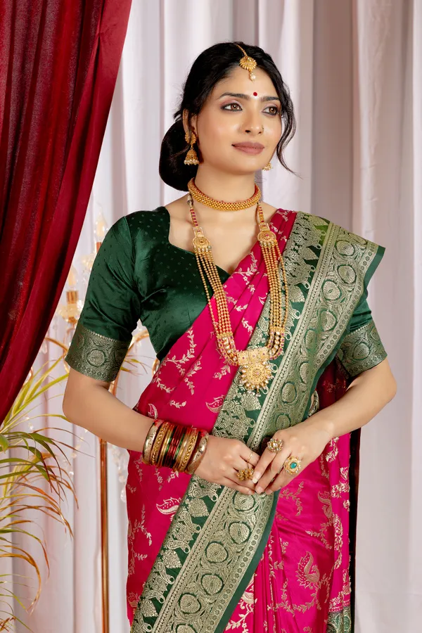 Banarasi_Pure_Satin_Silk_sarees_with_Beautiful_Peacock_in_Contrast_Green-Pink_Shades_With_Attractive_Weaving_Gold_Zari_Design_And_Contrast_Blouse_With_Tassels